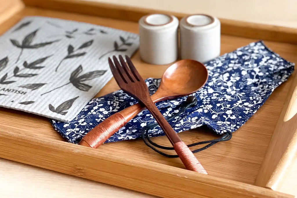 Simple Utensil Kit on a bamboo tray next to a Swedish Sponge cloth