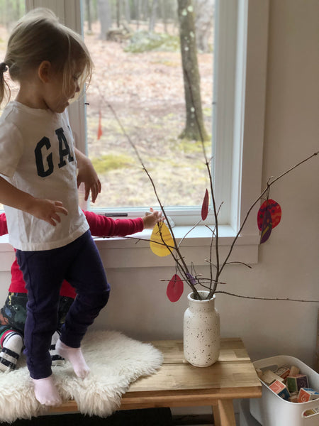 Photo of daughter with Swedish Easter Tree