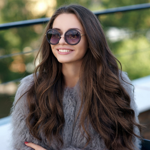 Woman in sunglasses with Rich Brunette long hair