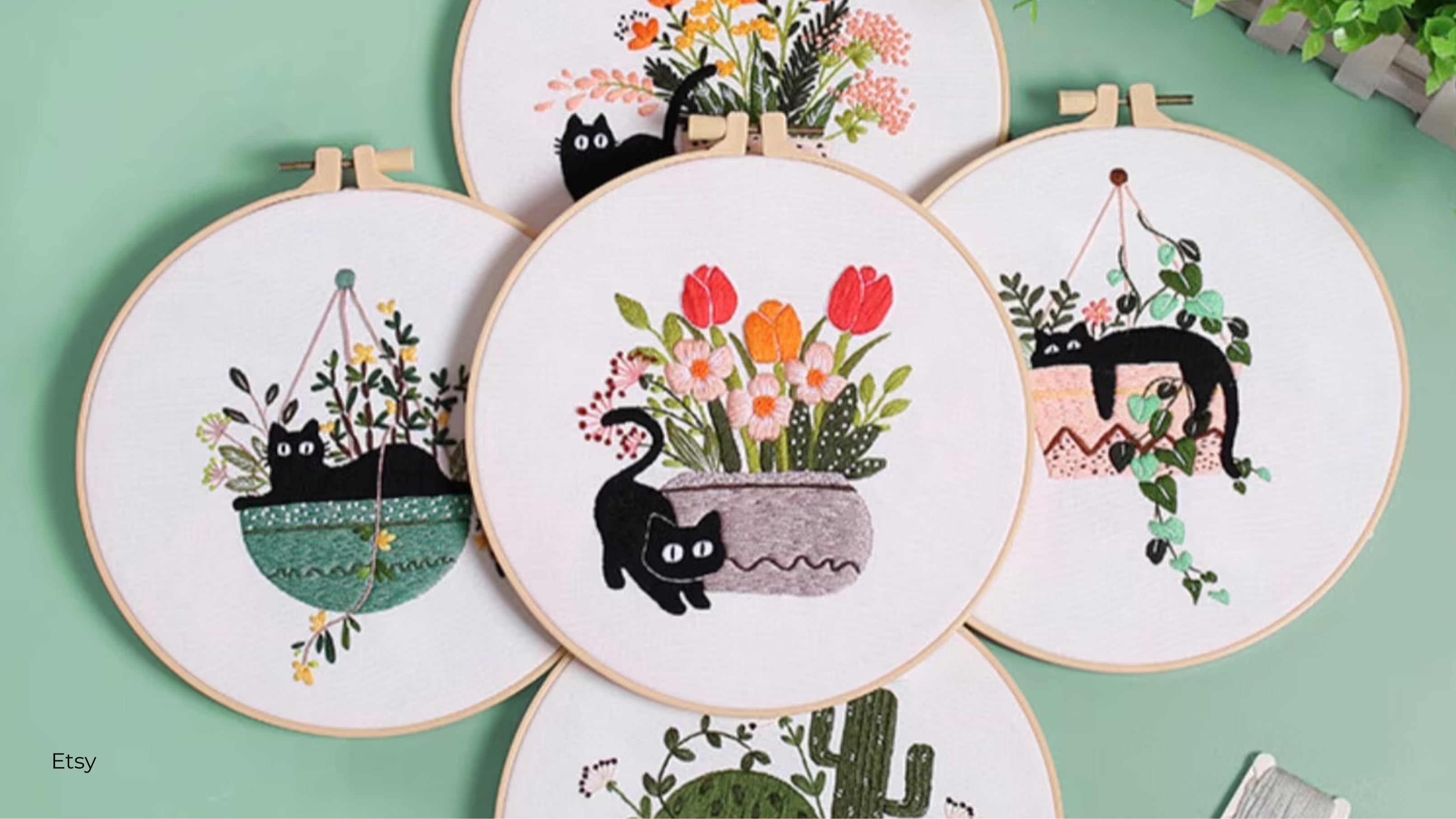 A set of cat and plant embroidery circles