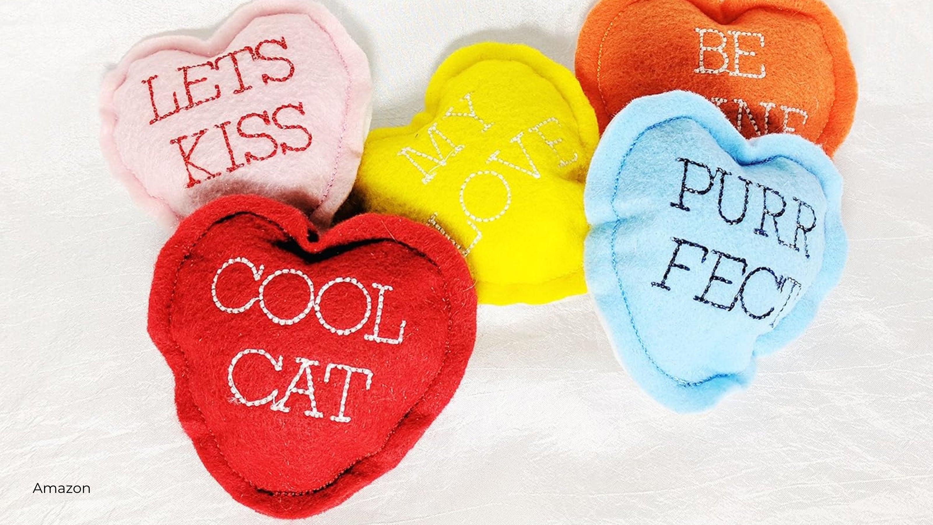 Colorful catnip infused plush Valentine heart toys with loving sayings