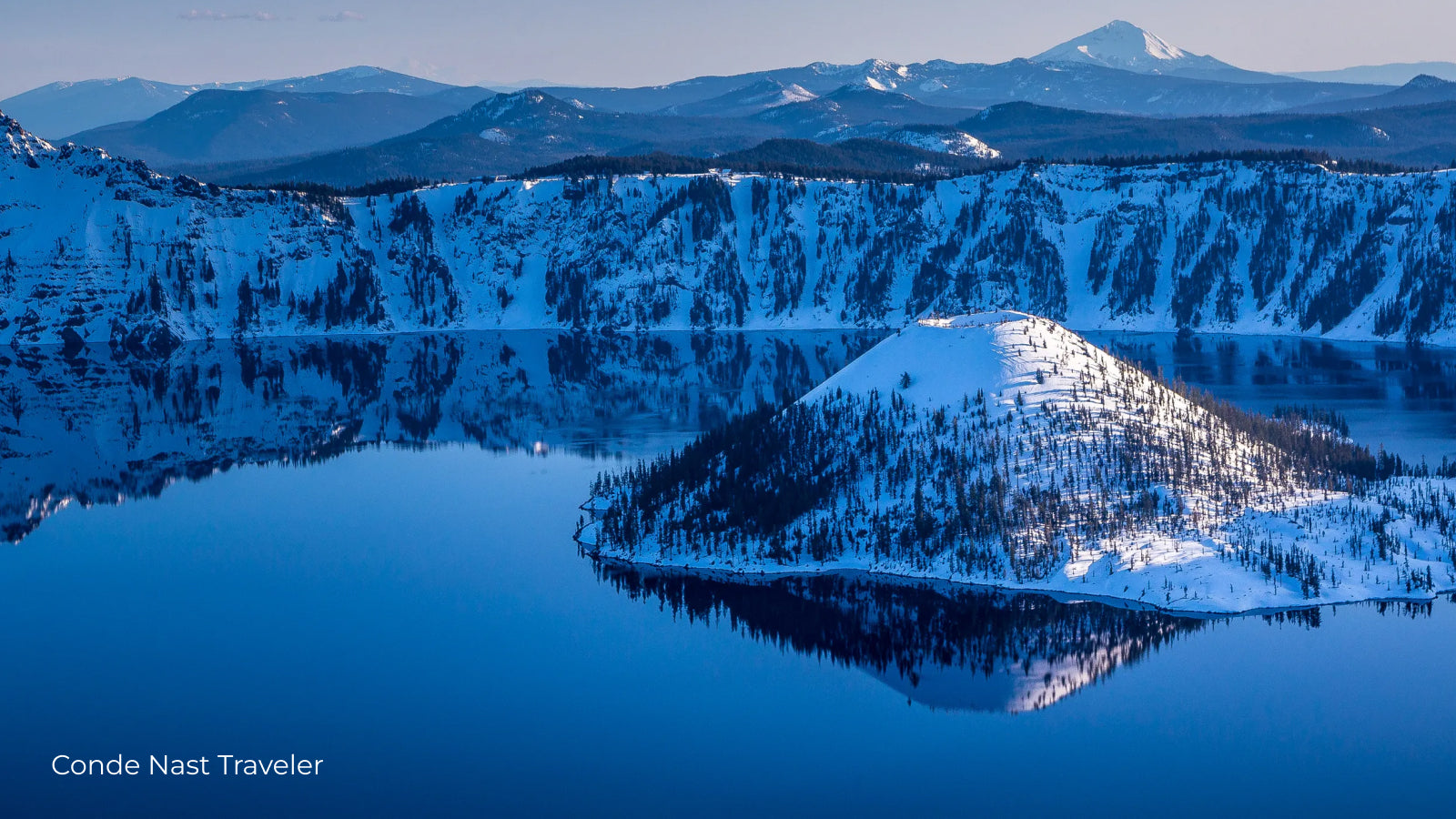 Crater Lake State Park with snow lake and mountains