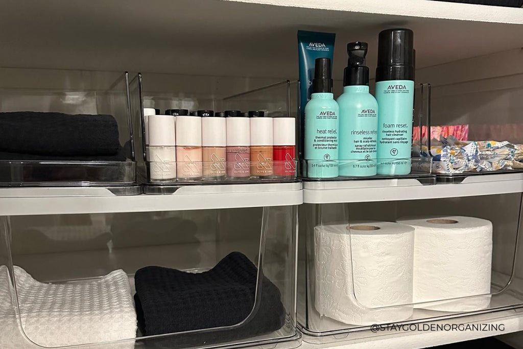Makeup and bathroom essentials placed on a shelf