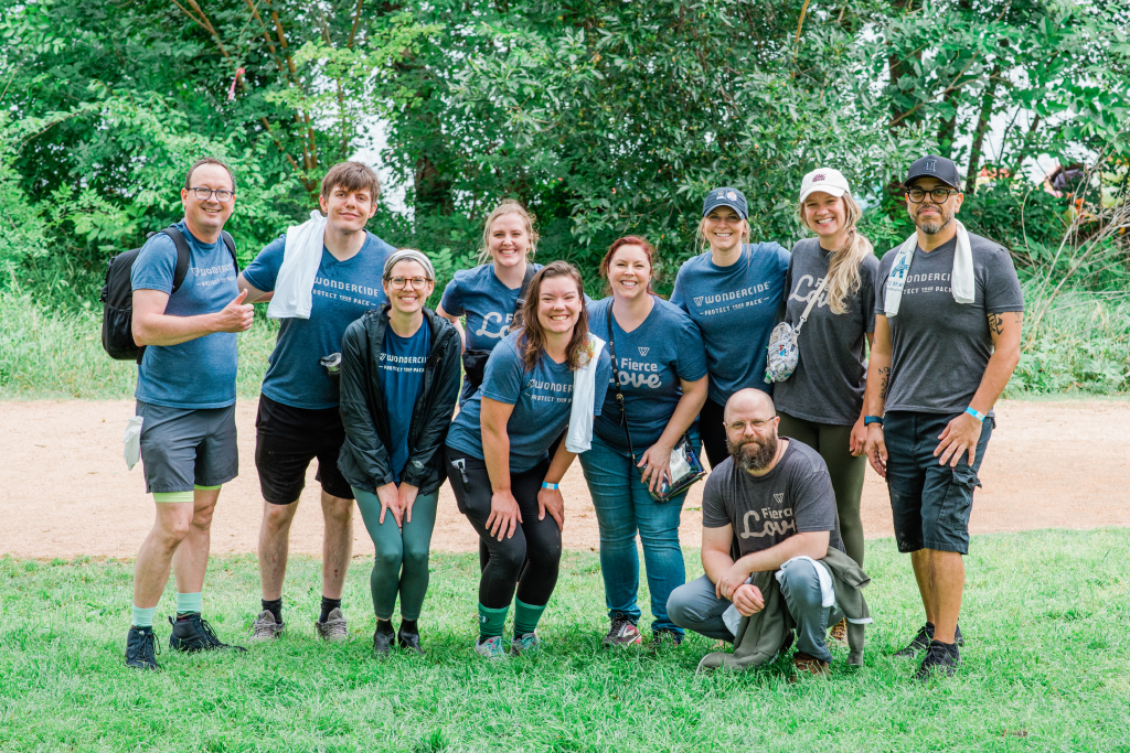 Wondercide teammates pose for a picture along the hike and bike trail in Austin TX after picking up litter