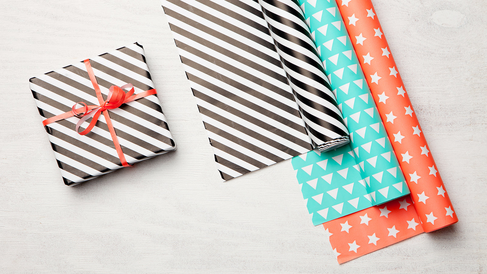 Wrapping paper with stripes triangles and stars