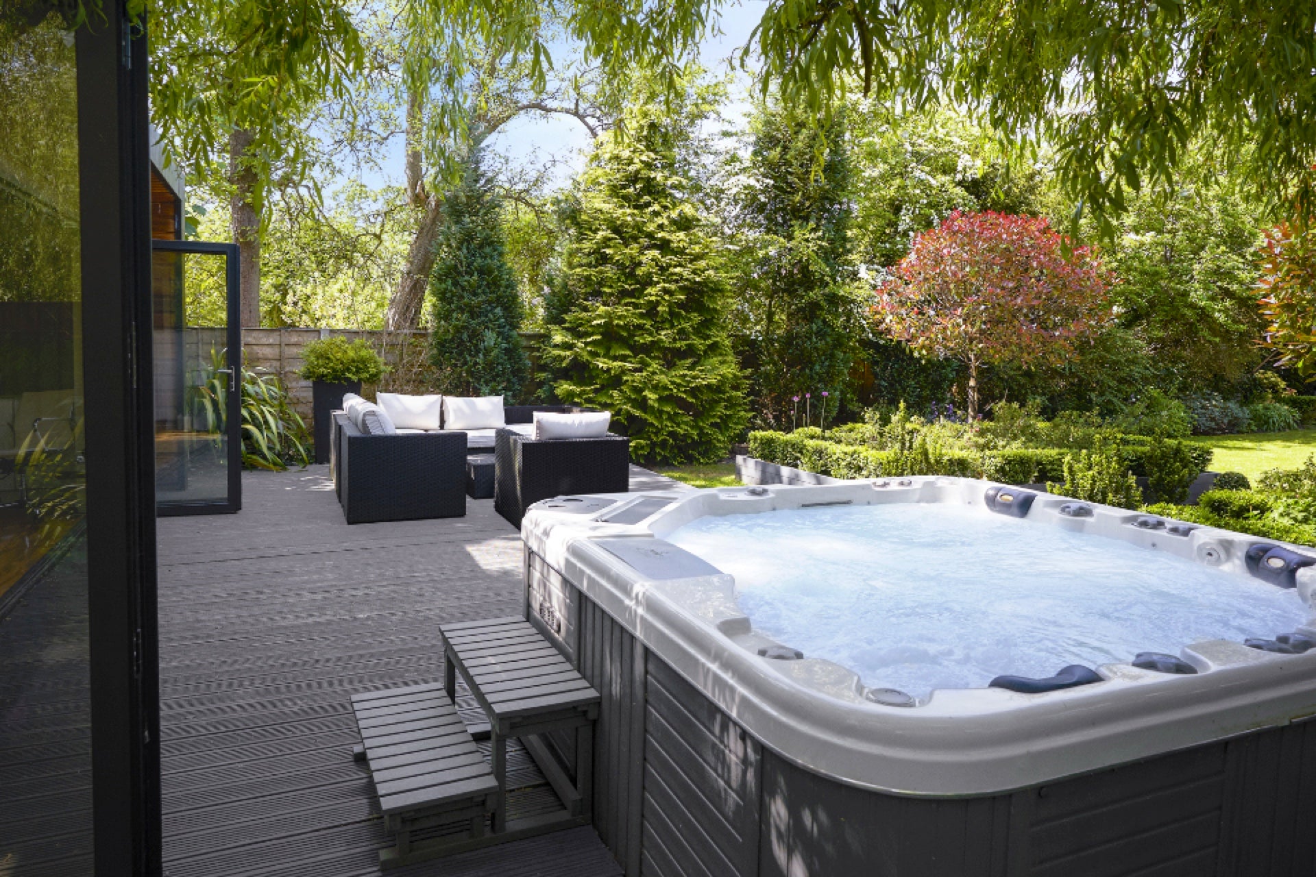 Hot tub and terrace in garden