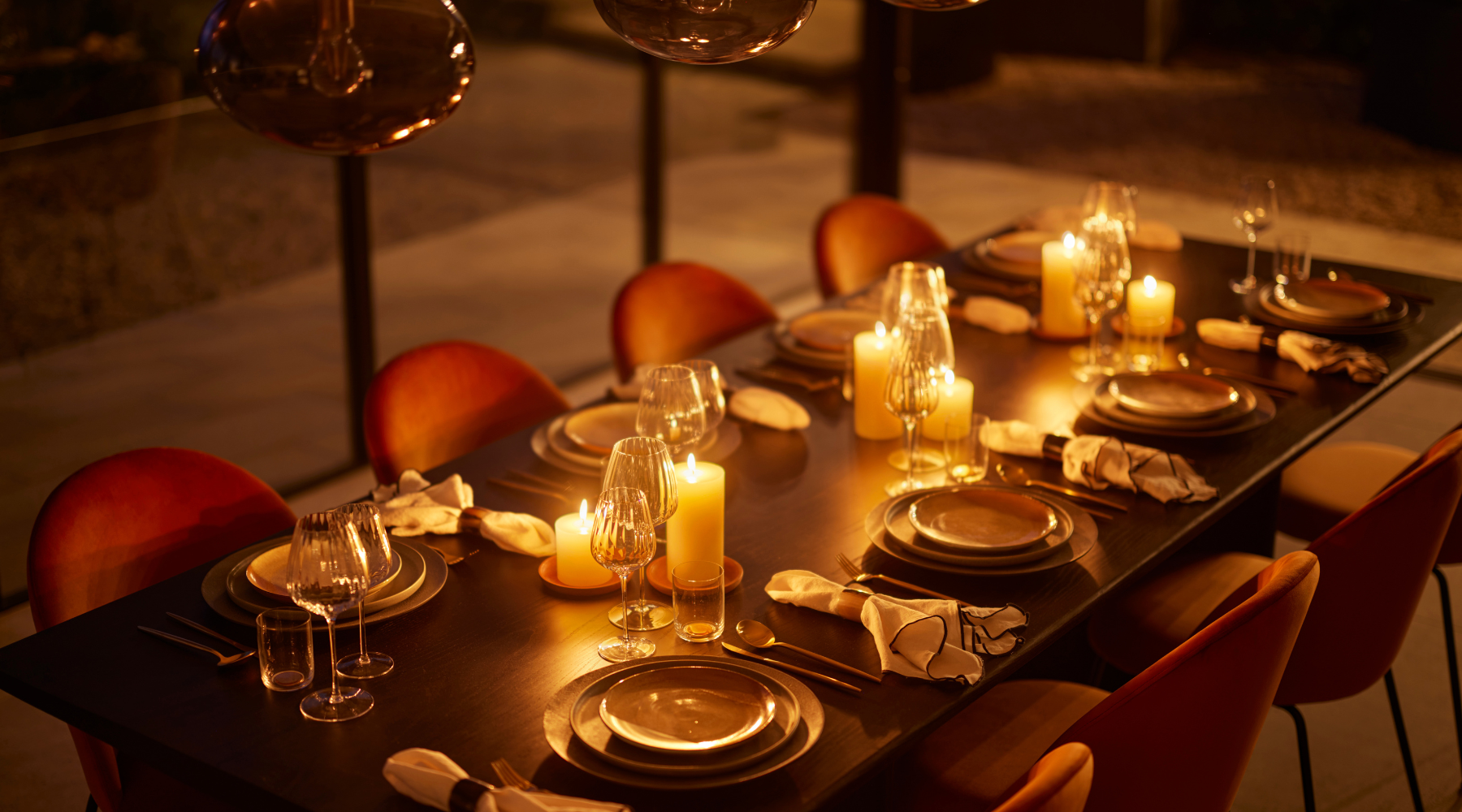 Omaze Million Pound House Kent Candlit polished ash dining table at night