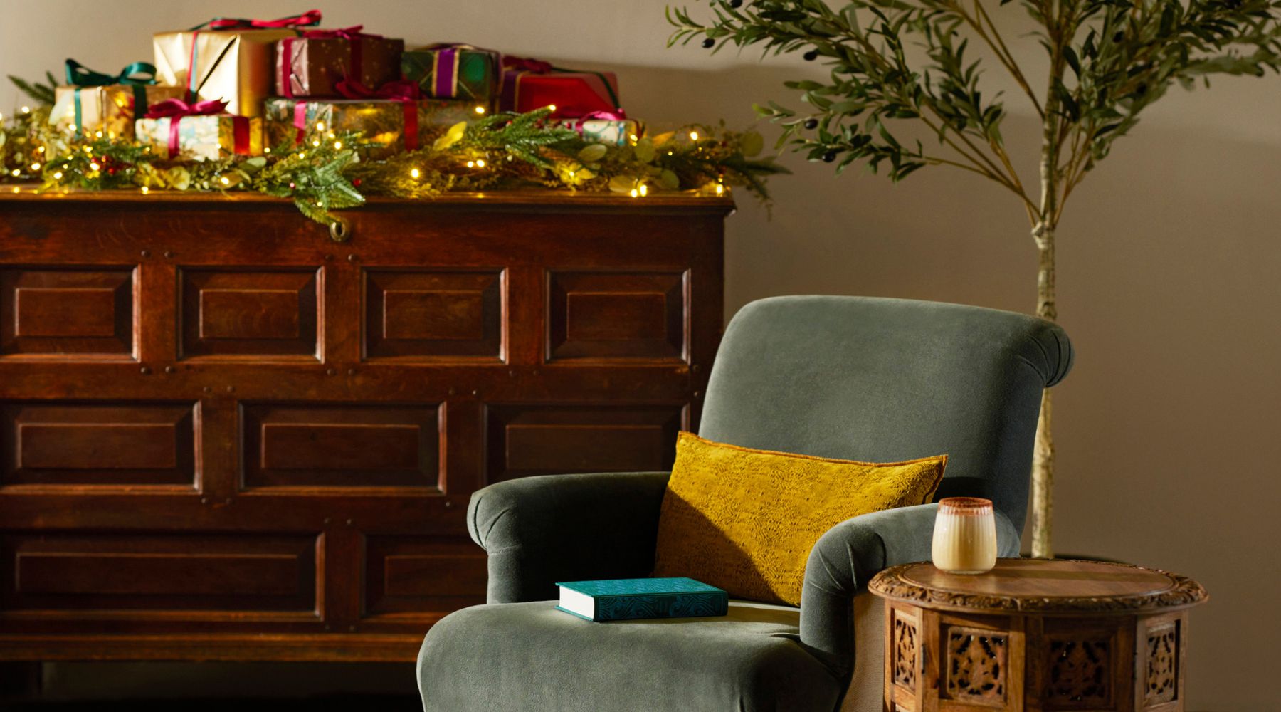 Omaze Million Pound House Lake District  - velvet armchair with book and eggnog 