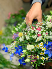 Florist creating bridal flowers