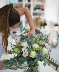 Florist arranging flowers