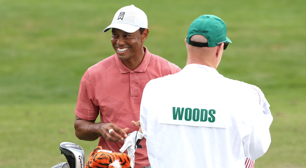 Tiger Woods preparing for the 2022 Masters Tournament with his caddie