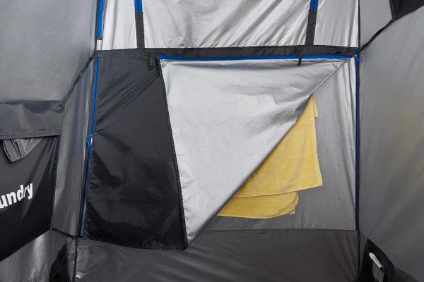 Covered compartment for clothes inside Joolca shower tent