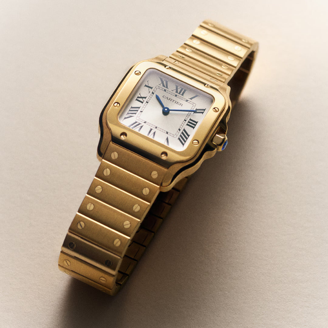 Close-up detail of Santos Small gold watch design