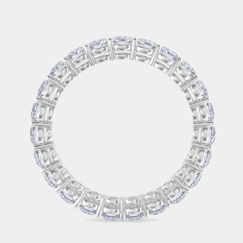 shared prong with air line round cut eternity band