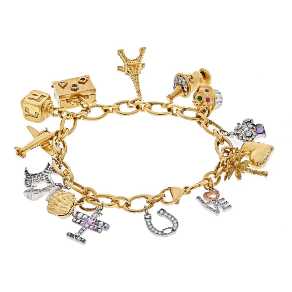 Sold at Auction: TIFFANY 18KT GOLD CHARM BRACELET - ETOILE DIAMOND