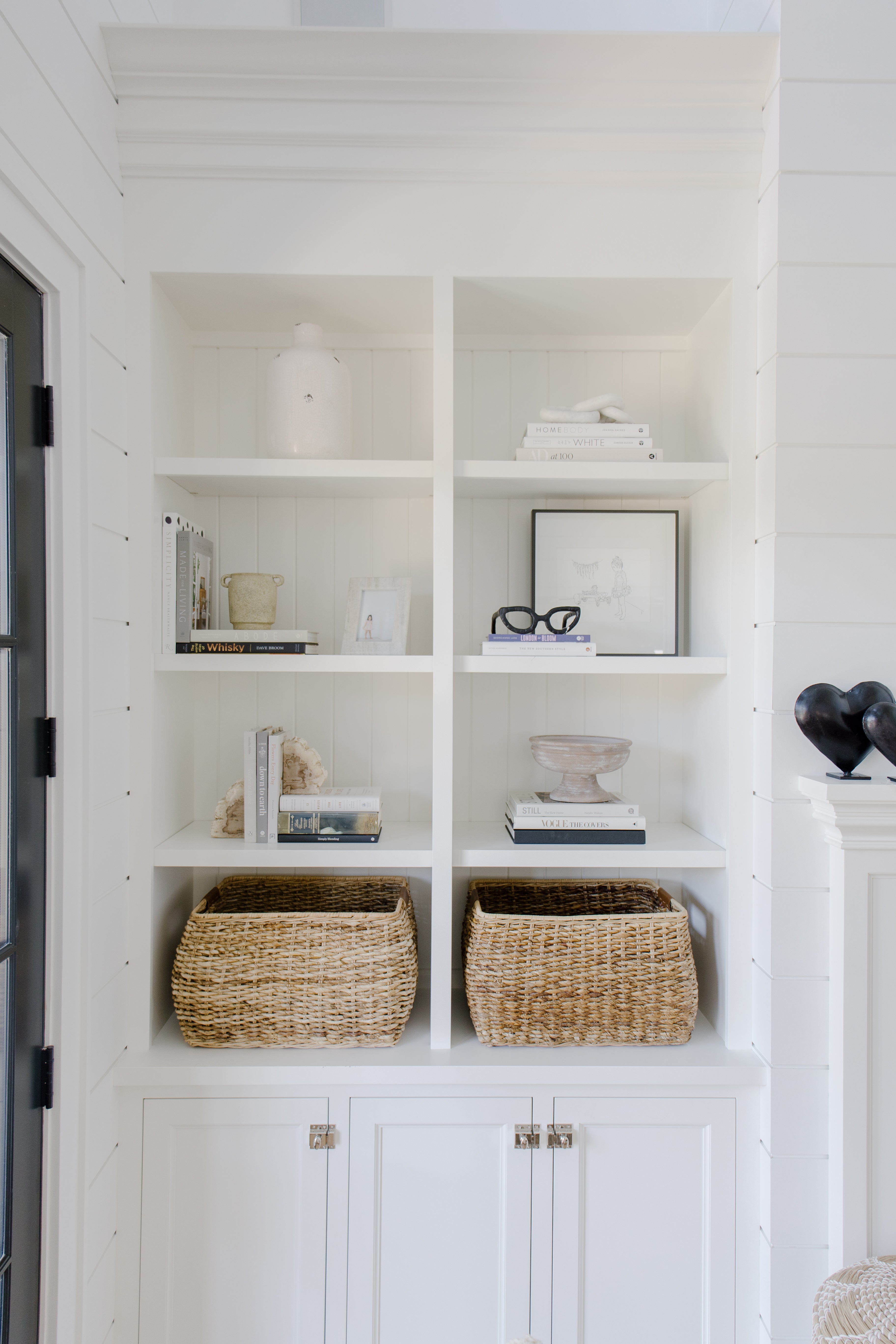 Shelf styling with baskets and accessories