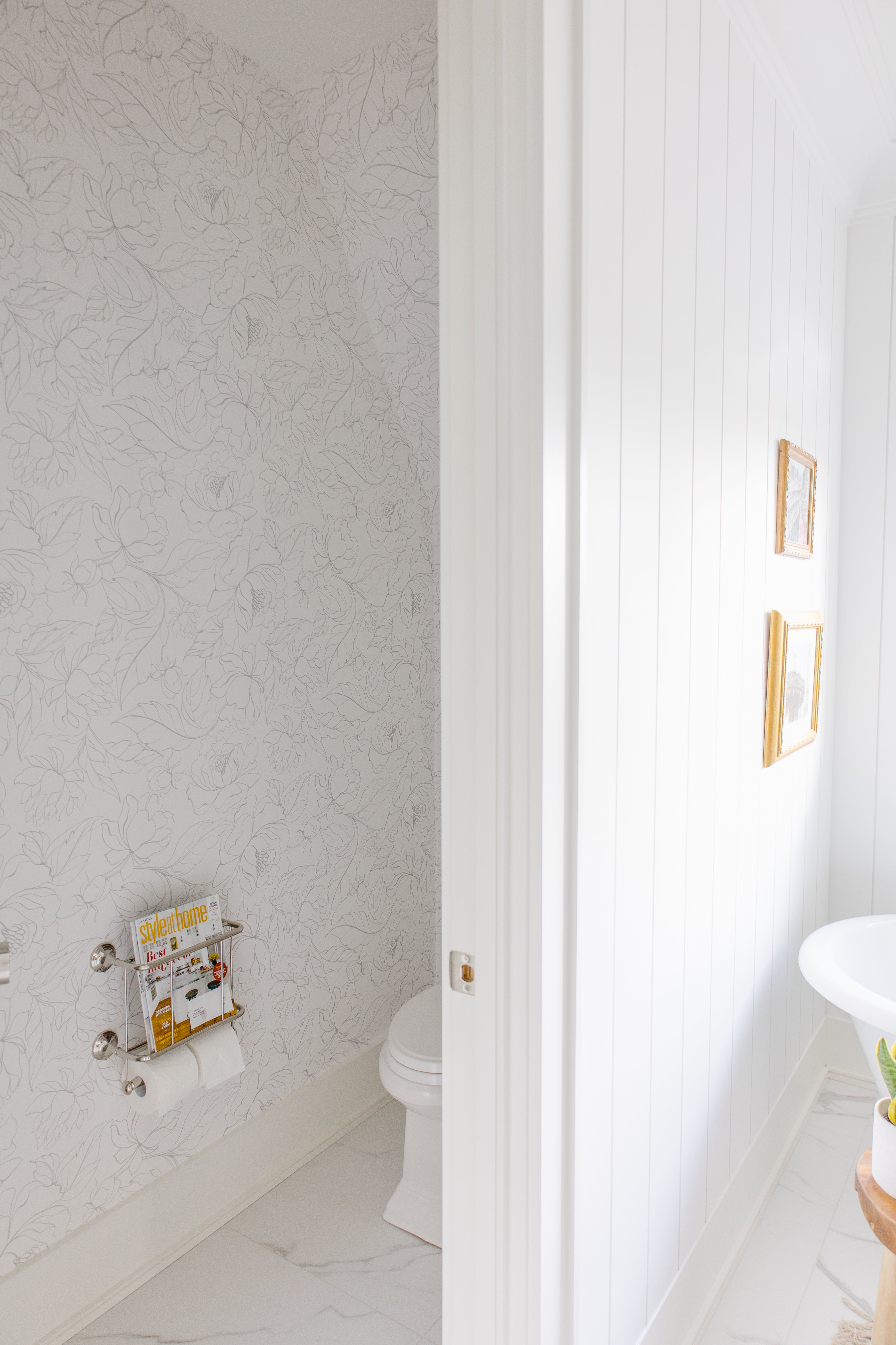 floral wallpaper in bathroom water closet