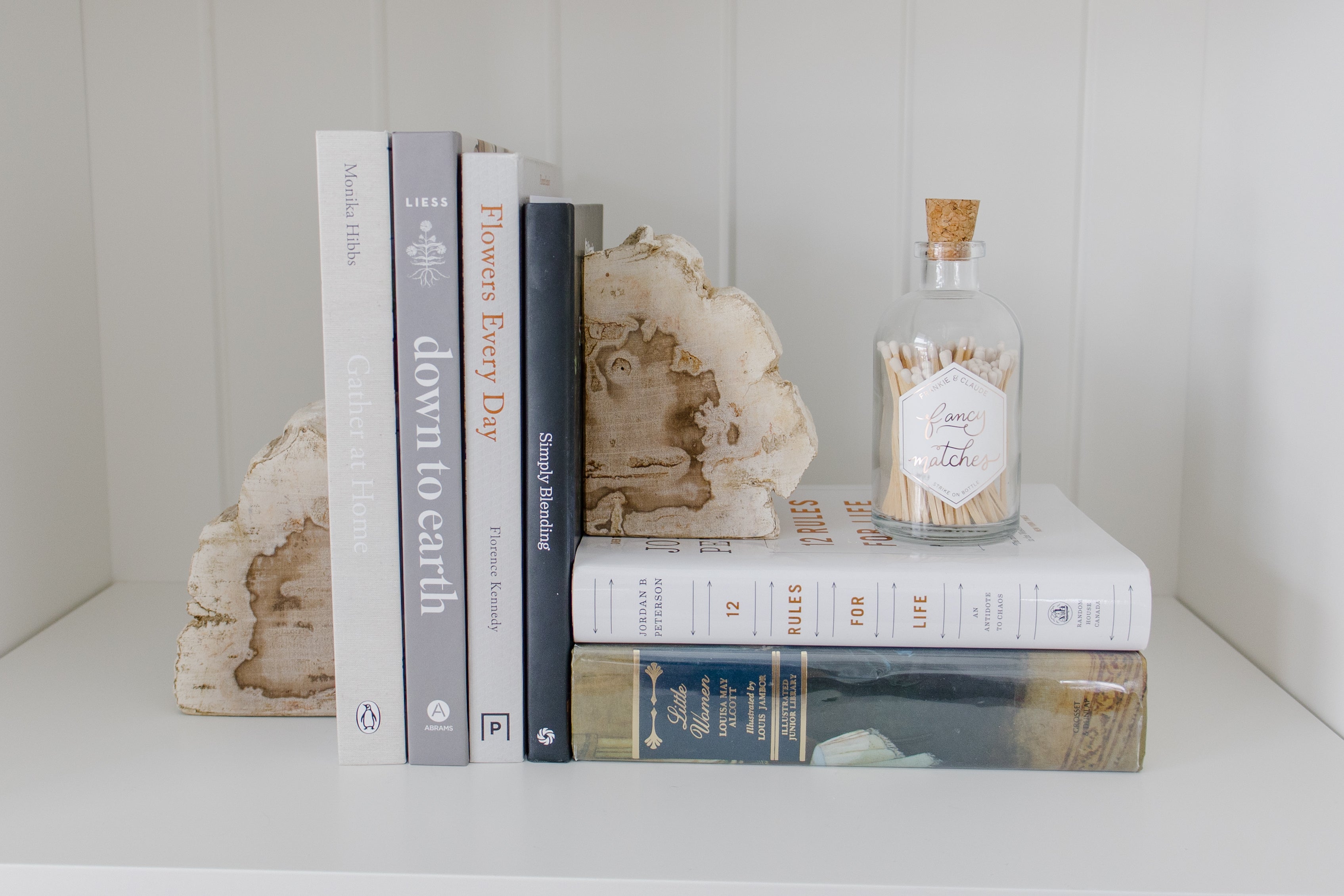 books displayed with book ends and matches