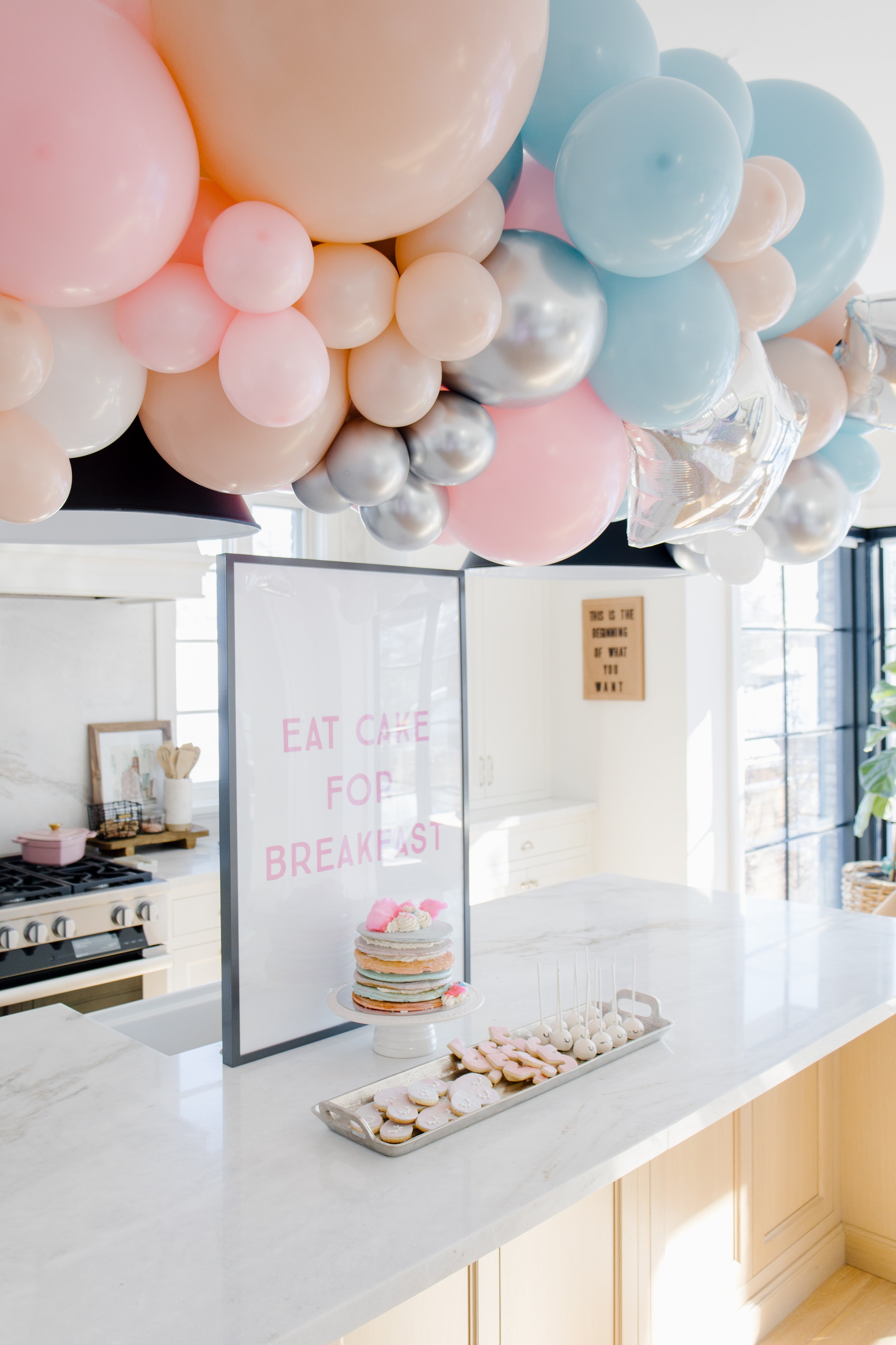 balloon garland over sweet table