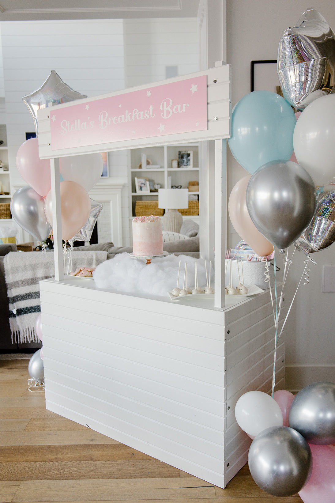 sweet table display with pink cake