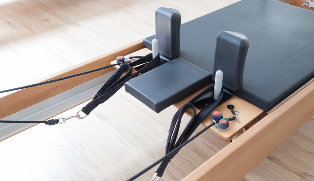 The reformer: An essential piece of Pilates equipment