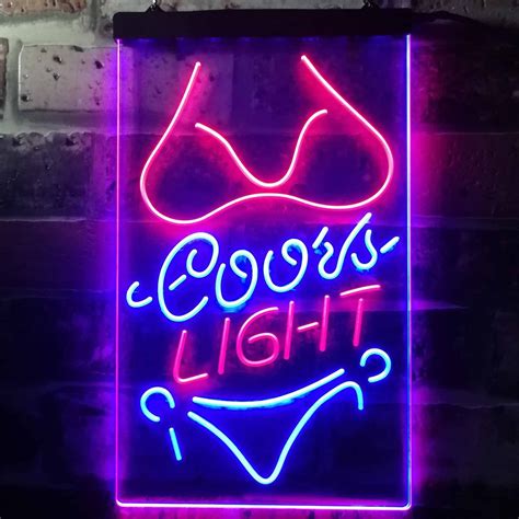 Signe de bikini néon unique à l'usine COORS Light