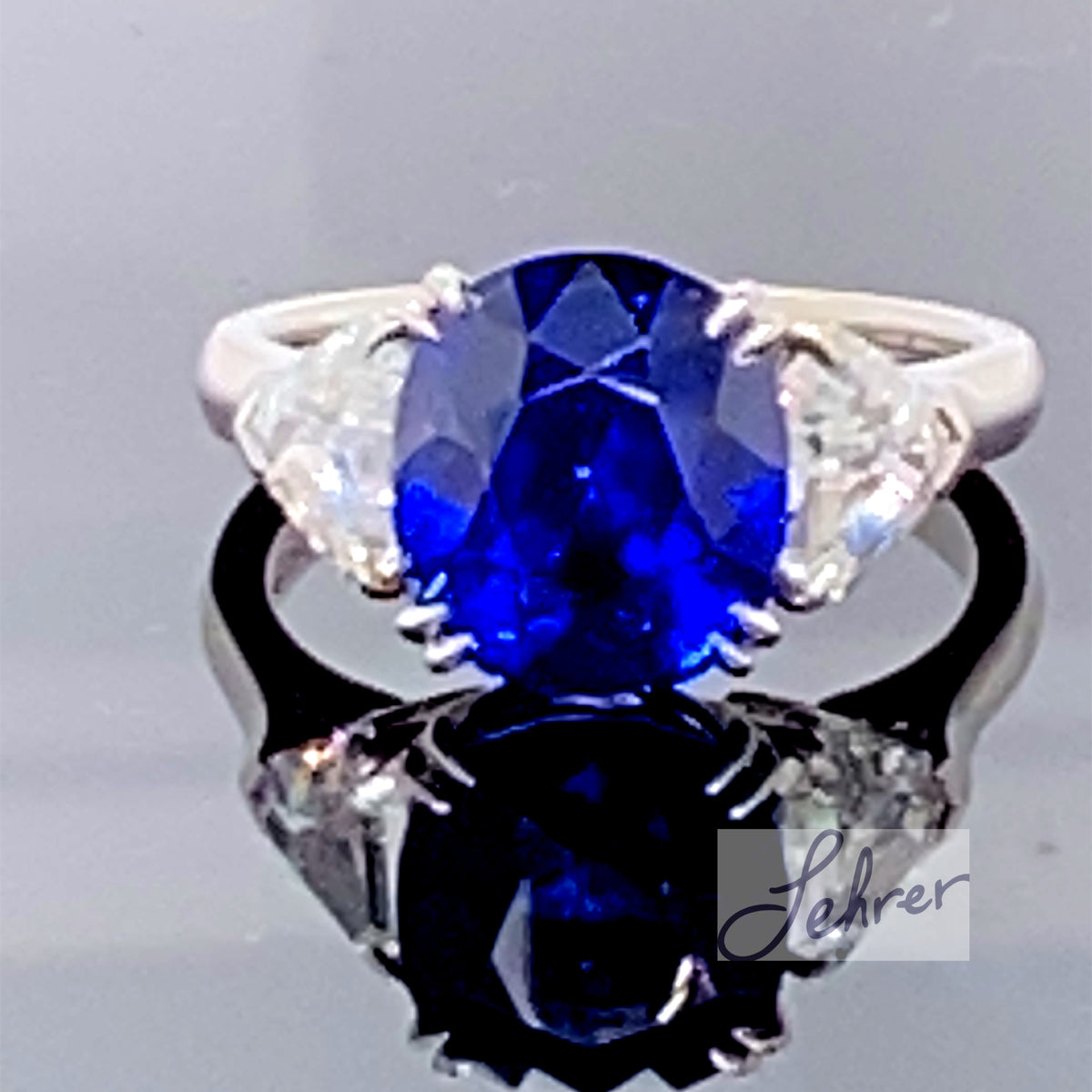 Blue Sapphire natural oval 5.50Ct Platinum Ring Diamonds 2-1.04Ct, Tw.