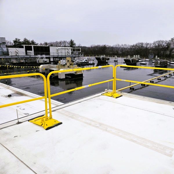 Nitto Denko Avecia with NextGen 3000® Railing on flat roof