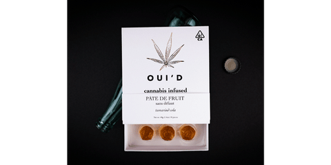 box of edibles partially open. box displays brand name and product name