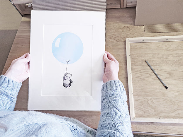 framing a children's pastel blue balloon nursery print