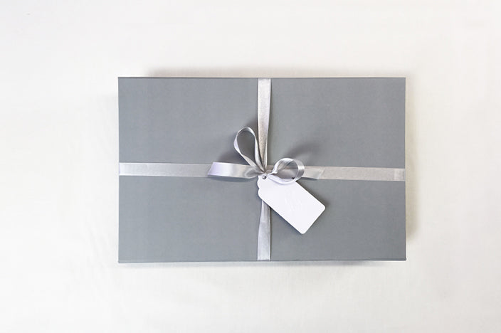 soft grey luxury gift box with satin bow