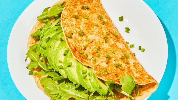 Belgian Boys Crepes topped with avocado and green onion