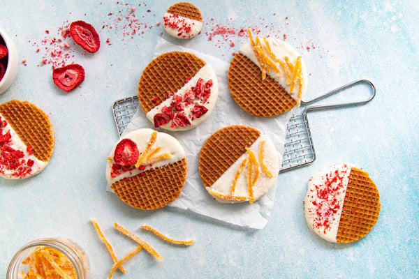 White chocolate dipped stroopwafels with orange zest