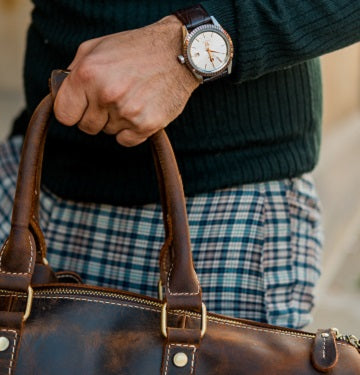 Add the finishes touches to any mens outfit with accessories.  A watch, bracelet, duffle bag