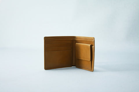 Who offers a durable made-in-the-USA men’s bifold wallet