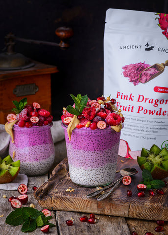 Dragon fruit chia pudding topped with raspberries