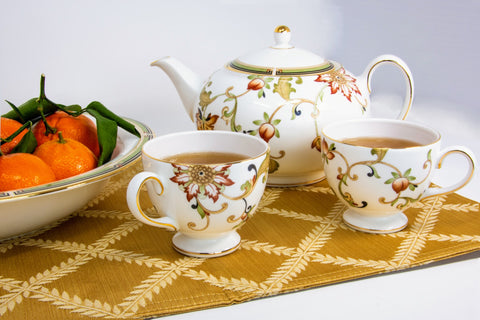 tea for two with fine china and healthy mandarins for a snack