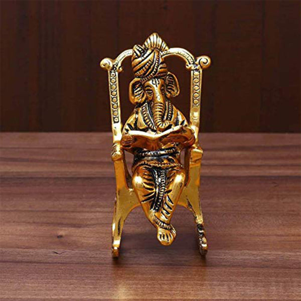 Brass 3D Moving Lord Ganesha Statue Sitting on A Chair and Reading Ramayan