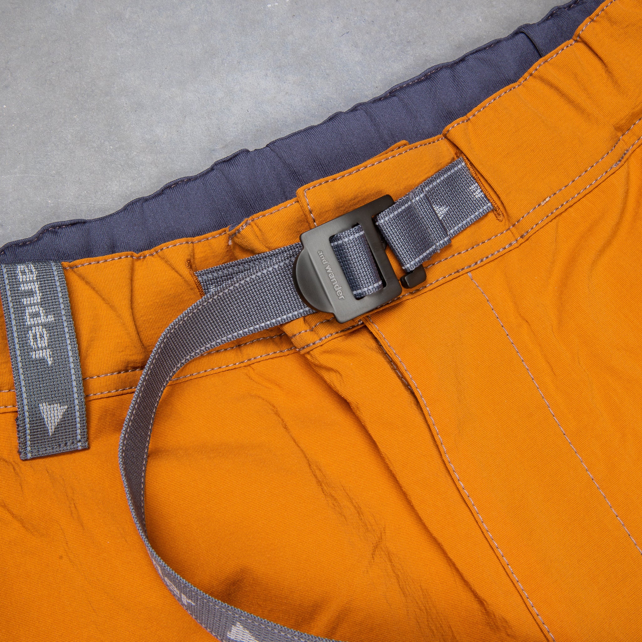 And Wander Light Hike Shorts Orange