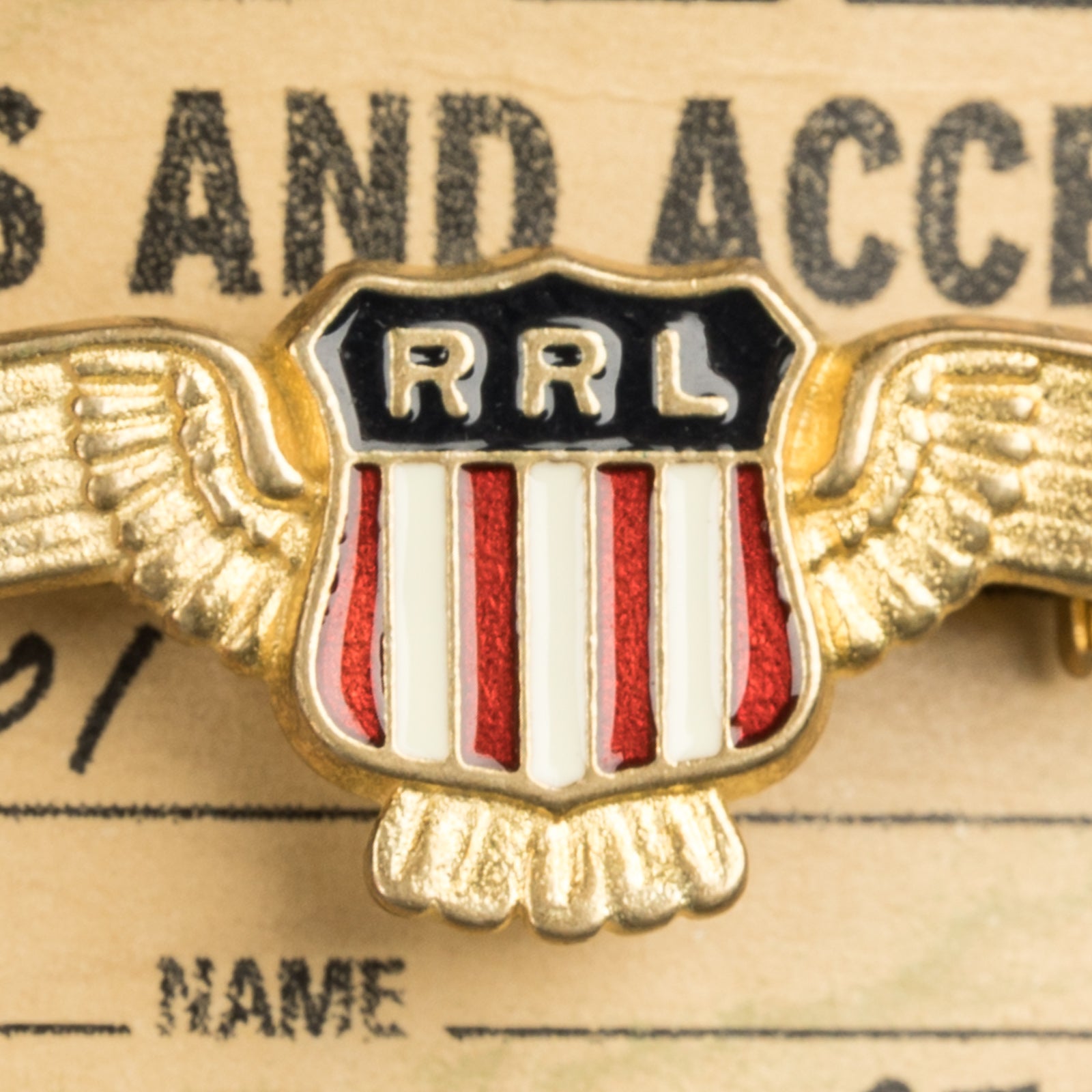 RRL Shield pin enameled brass