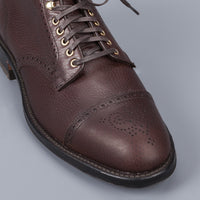 Alden Straight perforated cap toe boot in dark brown grained