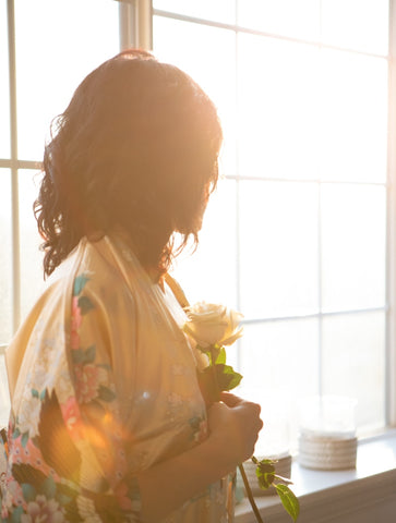 woman holding flowers