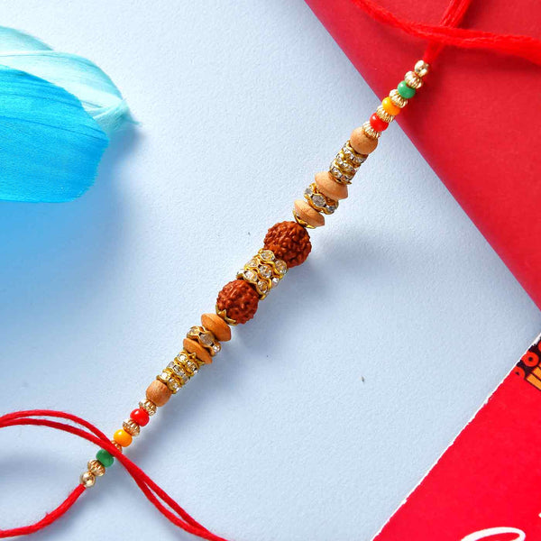 Online Sneh Pretty Beads Rakhi & Almonds Gift Delivery in QATAR - FNP