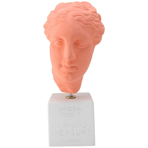 Hygeia head statue with engraved quote about healthy living