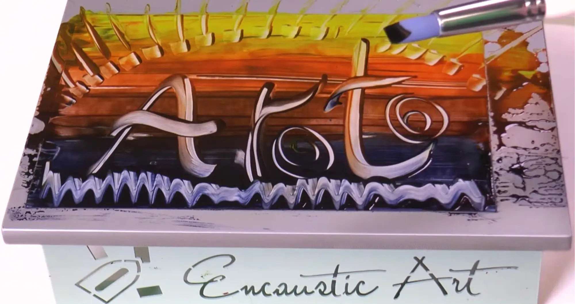 How to use a scraper tool for encaustic art