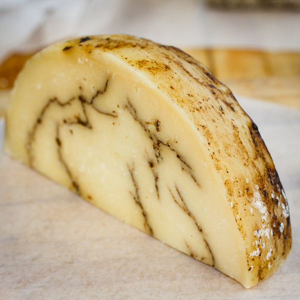 Buy Wheels of Pecorino Al Tartufo Cheese from Italy in Bulk Online