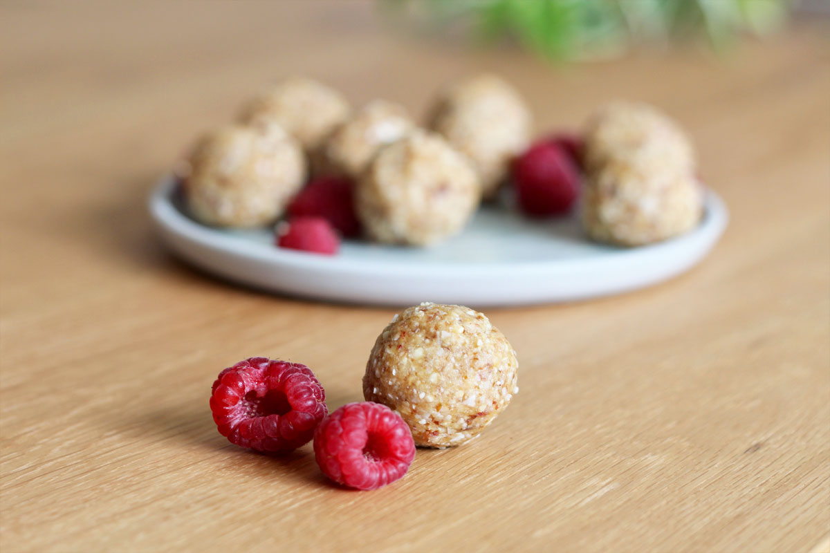 Raspberry macadamia collagen bliss balls