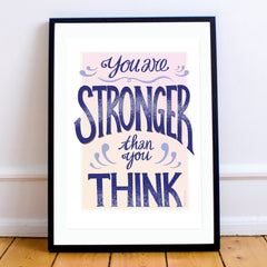 MarcoLooks Print saying "You Are Stronger Than You Think" in shades of indigo, peach and cream