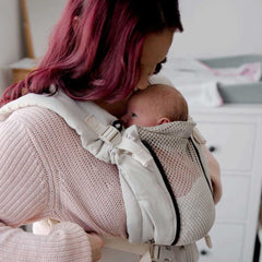 Gentle rocking movements while babywearing can calm down your baby.