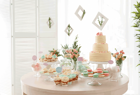 Dessert table set up, stands and arrangement